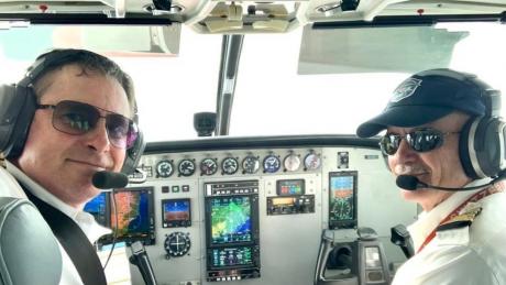 Pilots Roy Rissanen and Emil Kundig in the cockpit