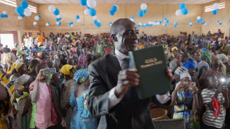 church leader glad to have the bible translated in Toma