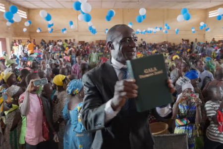 church leader glad to have the bible translated in Toma
