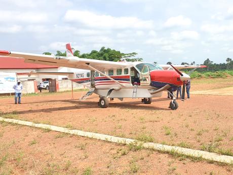 The MAF plane at Nzerekore for medevac of the injured.